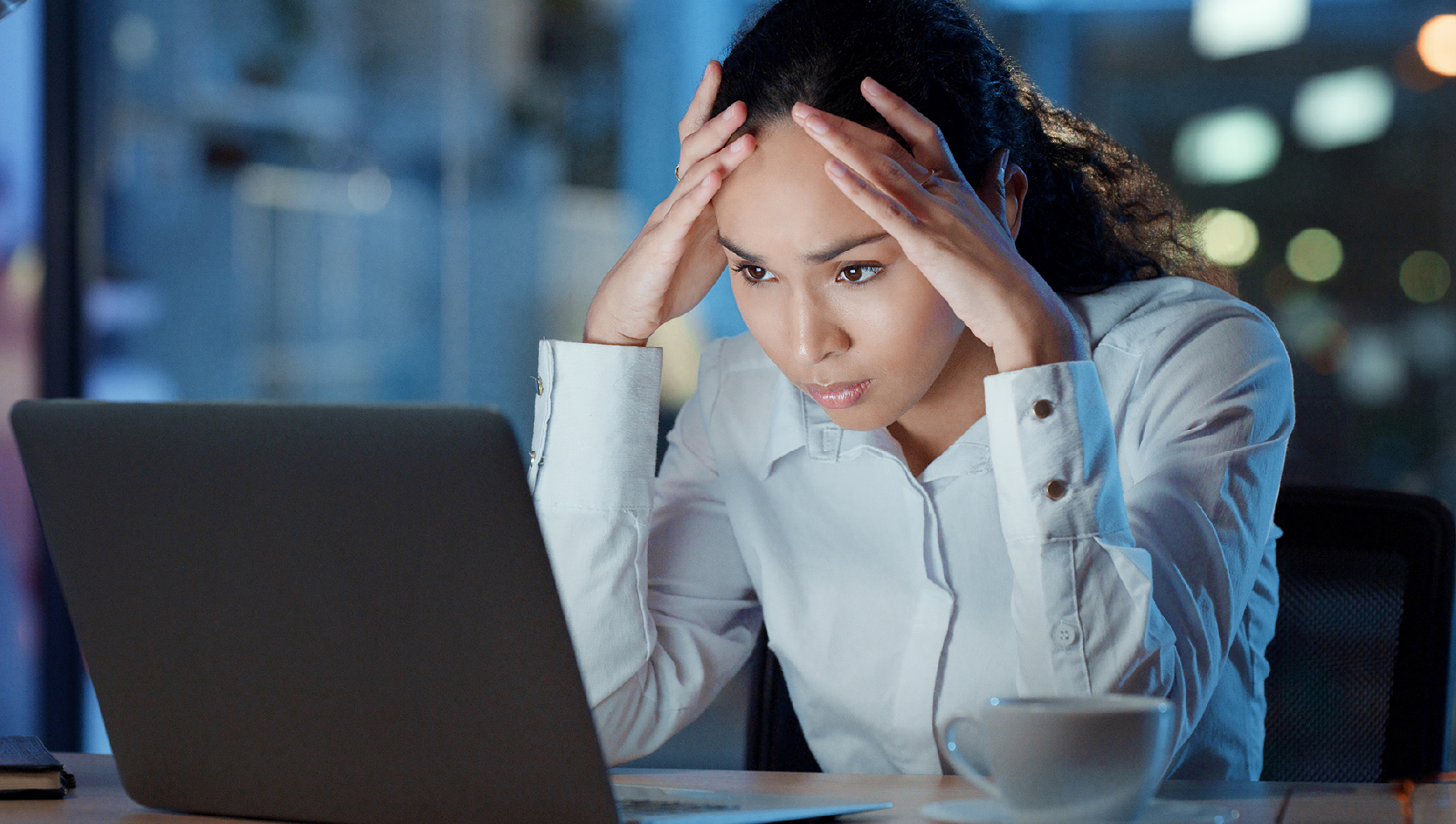 Women using computer stressed out.
