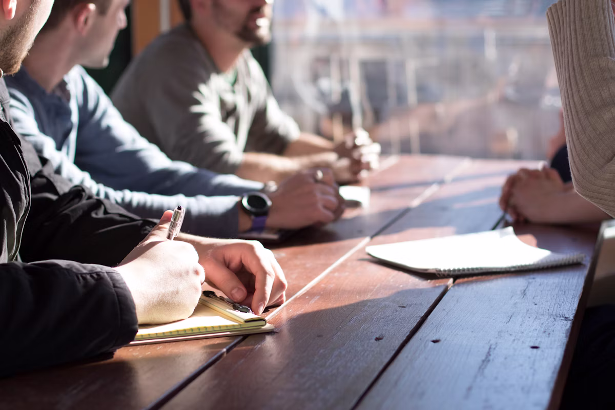 Team discussing product innovation in a meeting room